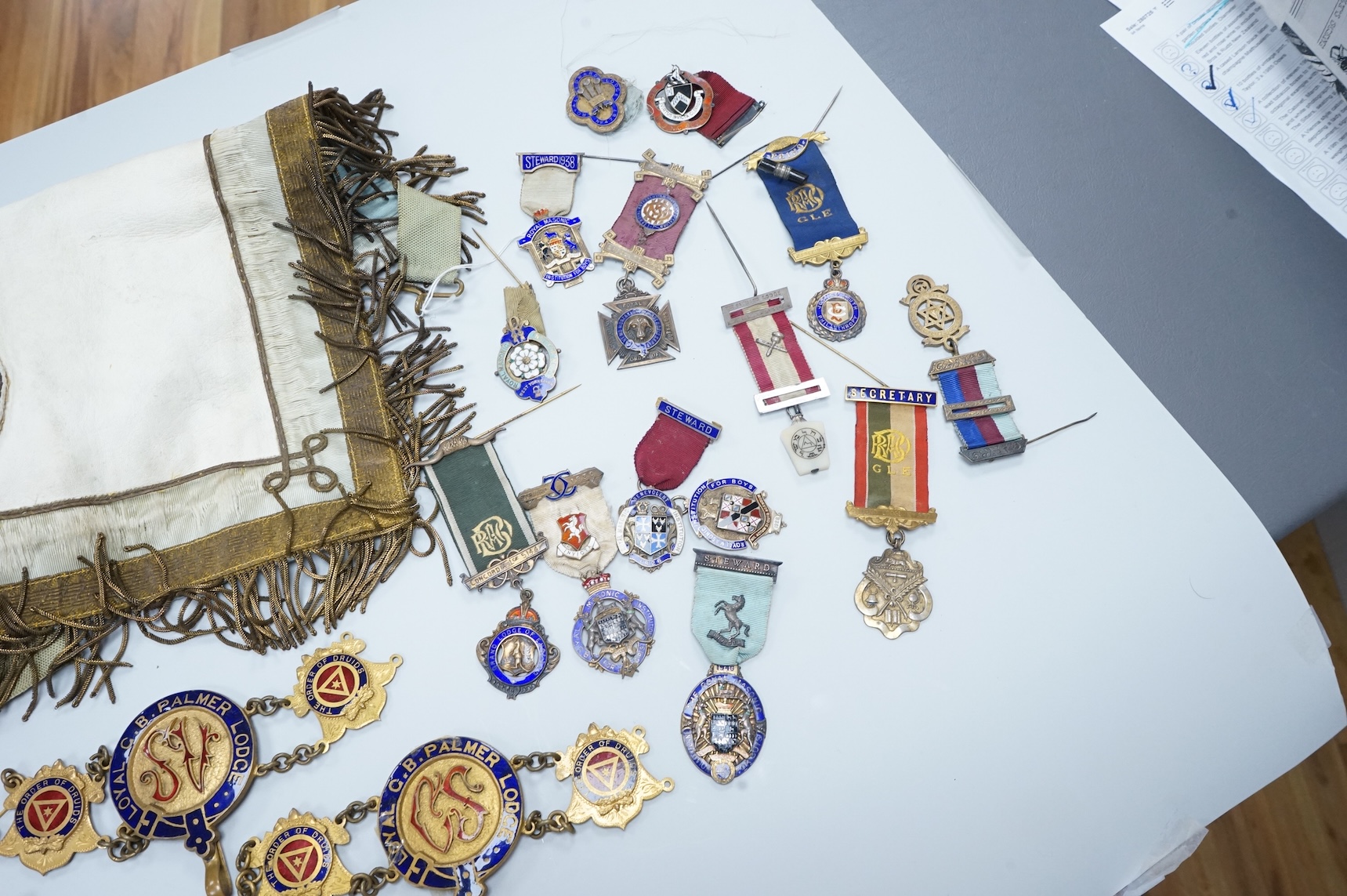 A group of Masonic medals, ‘jewels’ many enamelled and sashes, together with an early 19th century certificate